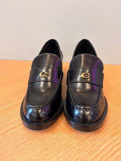Coach 8.5 Black heeled leather loafer w/ gold "C"