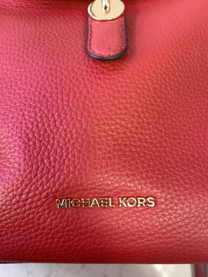 Micheal Kors  Red Leather backpack w/ gold hardware/multiple zips