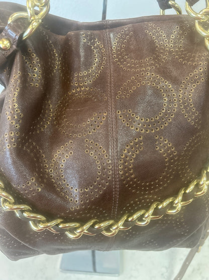 Coach  Brown vinage embossed gold CC med. leather w/ 2nd strap