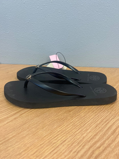 Tory Burch 8 Black rubber flip flops w/ gold logo