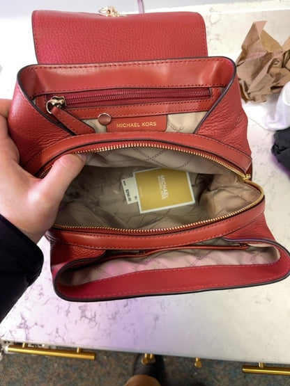 Micheal Kors  Red Leather backpack w/ gold hardware/multiple zips