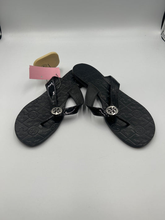 Tory Burch 10 Black patent flip flop w/ silver embem