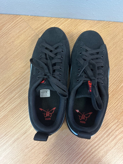 Puma 7.5 Black platform suede sneaker w/ blue/red accents
